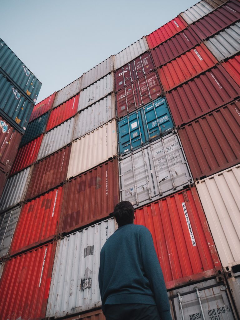 Bottom view of containers in a seaport that can be managed with IoT devices.